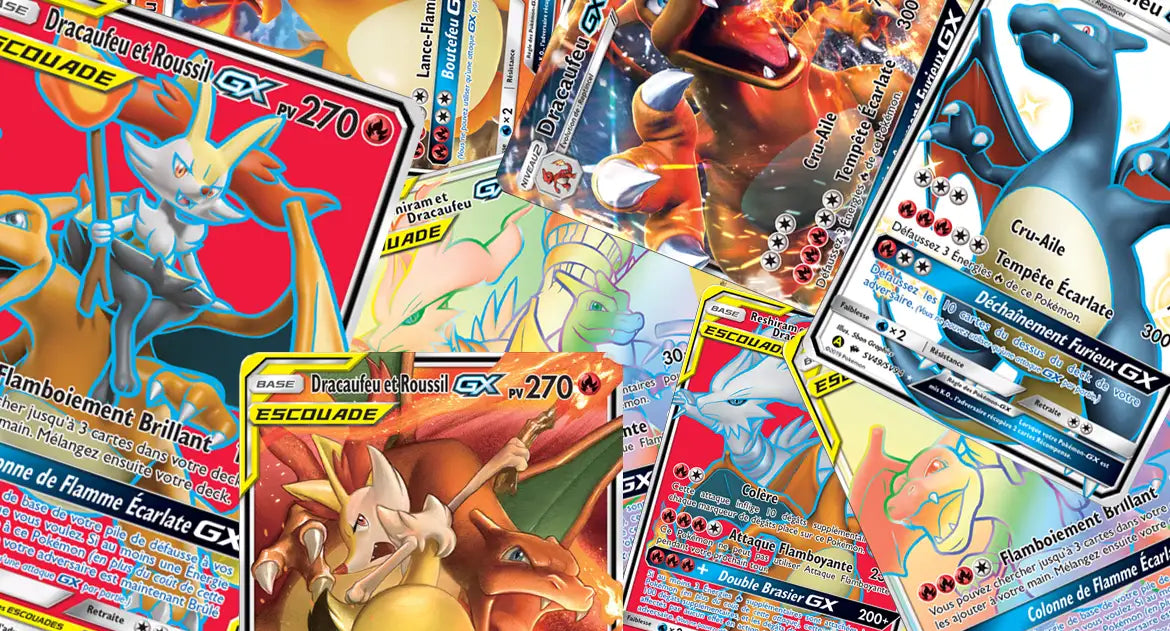 Cartes Dracaufeu GX Pokémon éparpillées dont Dracaufeu et Roussil GX